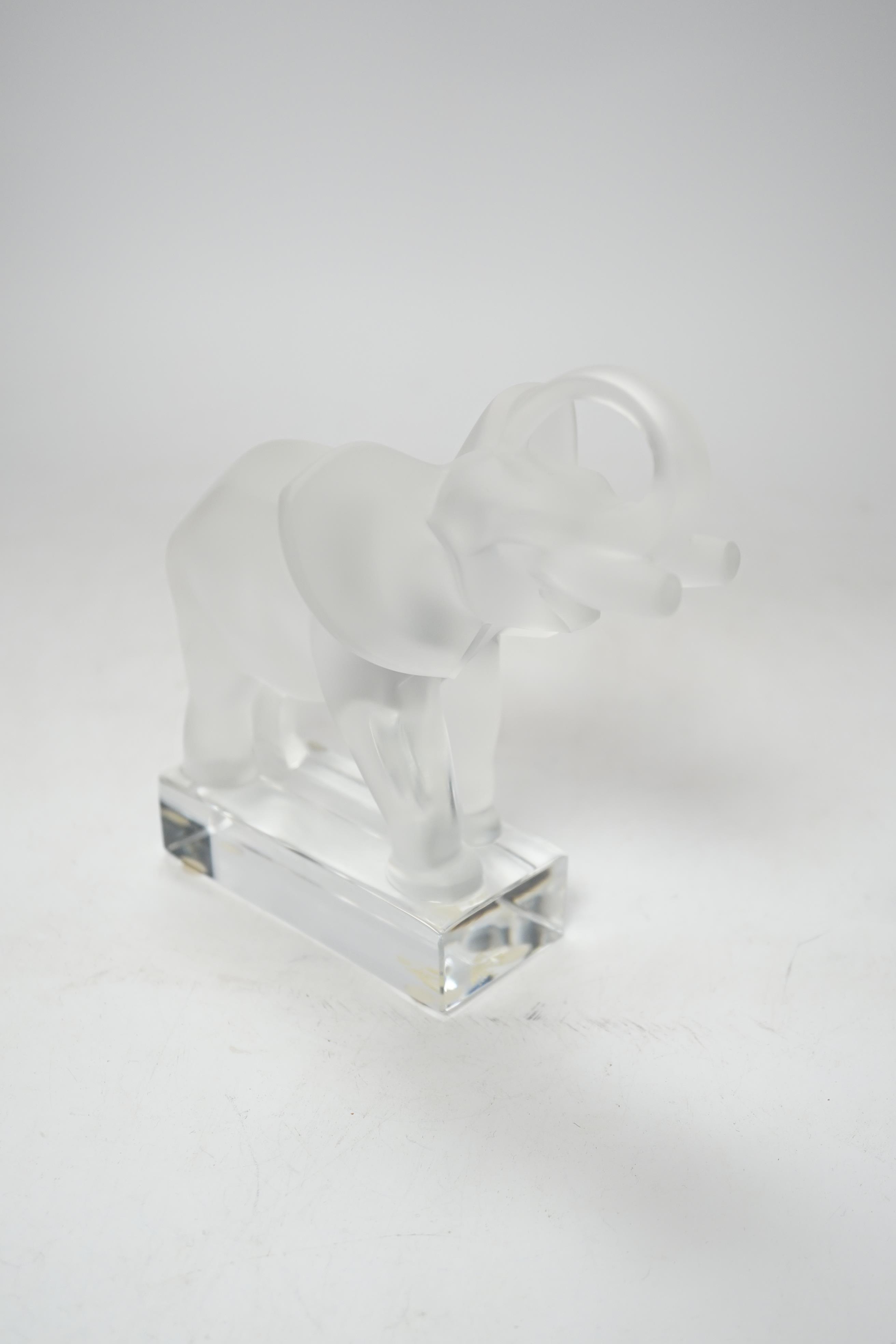 A Lalique frosted glass model of an elephant, signed to the base, 16cm high